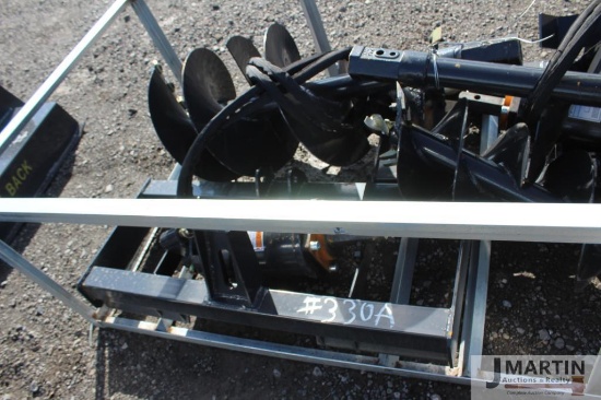 1- Wolverine post hole auger w/ 18" & 12" bits