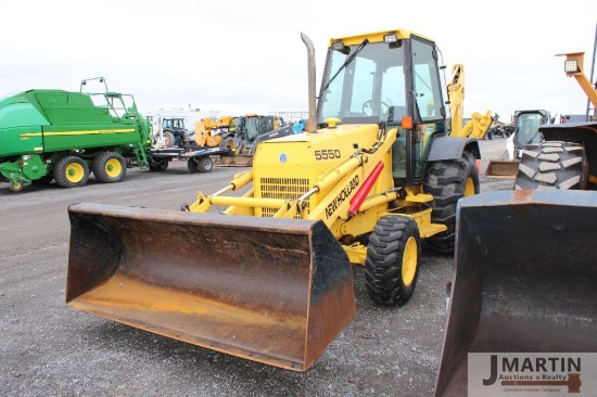 NH 555D backhoe