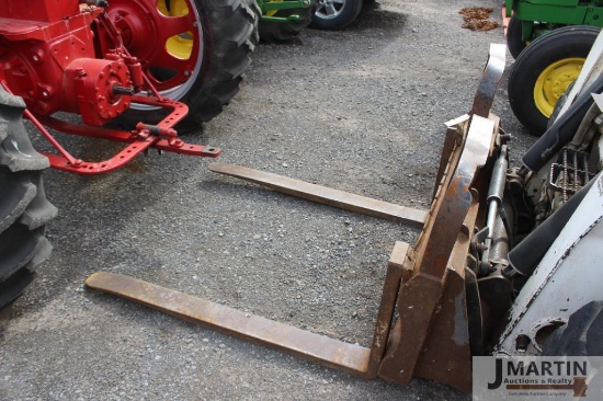 Skid mount pallet forks