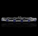 14KT White Gold 6.48 ctw Tanzanite and Diamond Tennis Bracelet