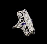 0.59 ctw Diamond and Sapphire Ring - Platinum