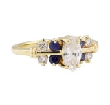 0.70 ctw Diamond and Sapphire Ring - 14KT Yellow Gold