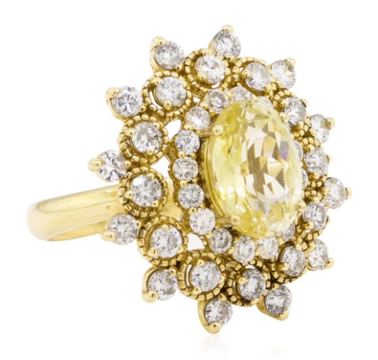 6.09 ctw Oval Mixed Yellow Sapphire And Round Brilliant Cut Diamond Ring - 14KT