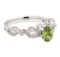 1.24 ctw Oval Mixed Demantoid Garnet And Round Brilliant Cut Diamond Ring - 14KT