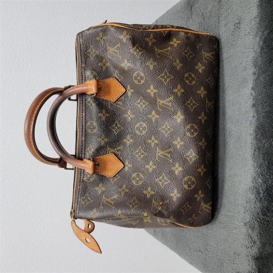 Sold at Auction: Louis Vuitton Bag Randonnee GM Drawstring Bag