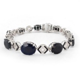 29.31 ctw Blue Sapphire and 0.25 ctw Diaond 18K White Gold Bracelet with Black E