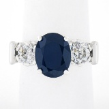 Vintage Platinum 4.95 ctw GIA Oval Dark Blue Sapphire w/ Old European Diamond Ri