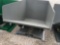 Forklift tipping dumpster, unused