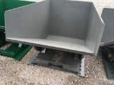 Forklift tipping dumpster, unused