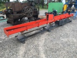 Vibrating conveyor with grinder infeed