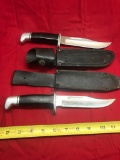 2- Buck USA Knives Both No 119, one with matching sheath, and one with replacement sheath