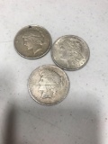 3- Silver Dollars, 1922 (rough), 1921 Morgan, and 1923 (holed), selling times the money
