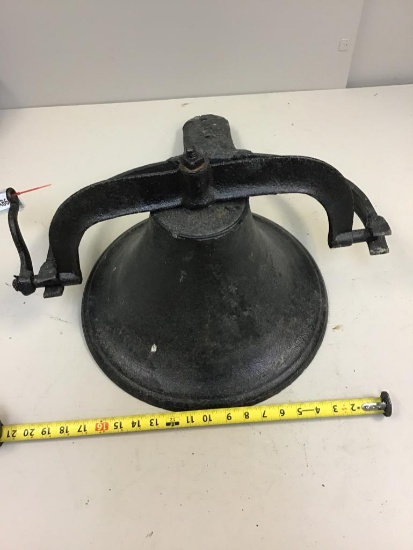 Vintage cast iron bell with clapper and bracket