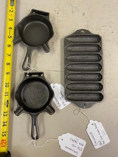 2- Griswold 570-00 ash trays and Griswold 262 tea size corn stick