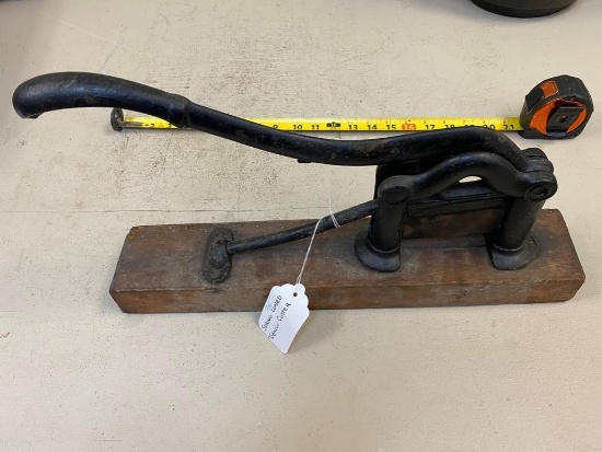 Spring loaded tobacco cutter