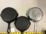 3- Griswold No. 3 Skillets, with various era logos