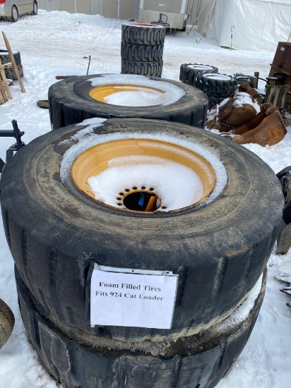 Set of (4) Foam Filled Cat 924 Loader Wheels