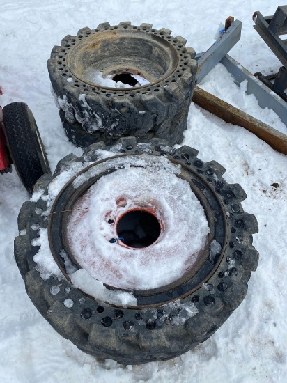 Set of (4) 8 lug solid Skidloader wheels