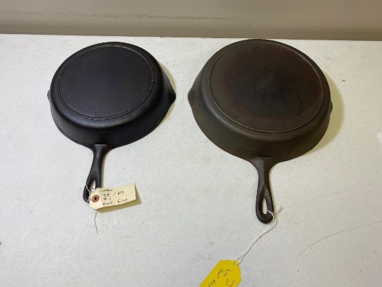 Pair of 3 notch Lodge Skillets, no. 8 and 10