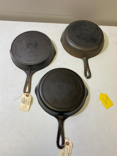 3- Cast Iron Skillets, unmarked Griswold 7 w/ heat ring, Lodge no.7 & Wagnerware N0. 1357