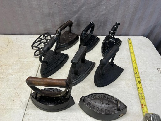 8 Sad and Cast Iron Clothes Irons