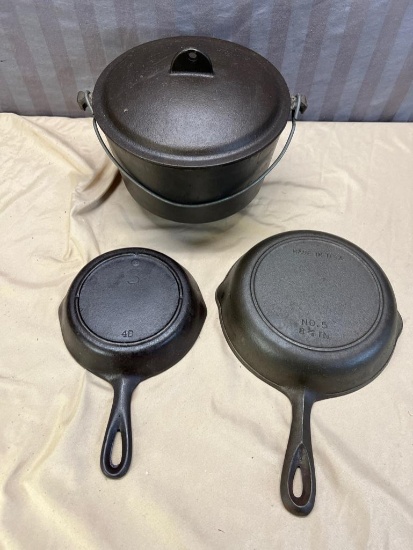 3 notch Lodge No. 3, No. 5 SK skillet, and Newer 3 footed Kettle with lid
