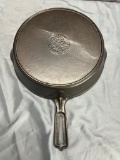 Wapak Indianhead no. 8 Cast Iron Skillet w/ mold mark (imperfection) on bottom, sits flat