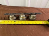 Graduated set of collar bells