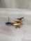 4 Brass Miniature Anvils some advertising
