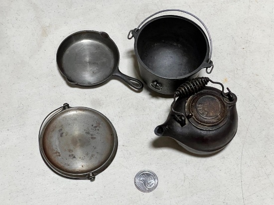 Set of 4 Griswold Miniature Sample cast iron pieces, Skillet, Tea Kettle, 3 Footed kettle, & griddle