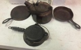 4- Piece Griswold Miniature No. 0 set, griddle, waffle iron, skillet and tea kettle sample set