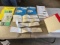 Large asst. of Ford/ New Holland Manuals and stickers
