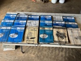 Large asst. of Ford/ New Holland Manuals w/ wall racks