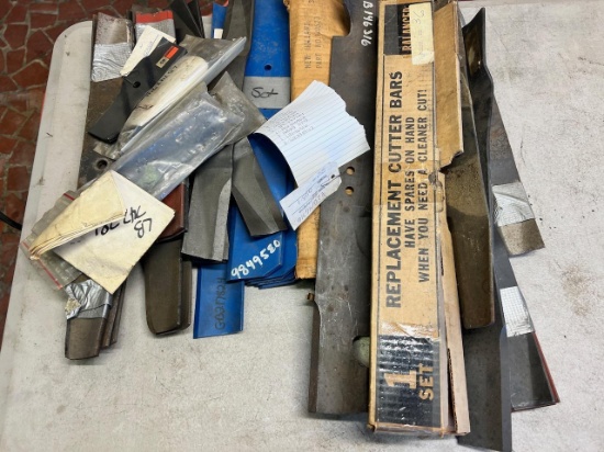 Lot of Asst. mower blades, see pics for parts numbers