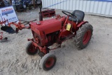 (INV) JIm Dandy garden tractor; brakes dont work; runs and drives has 5 attatchments