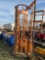 Fence unroller attachment for skid steer