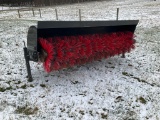 Power angle brush for skid steer