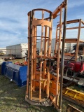 Fence unroller attachment for skid steer