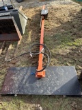 Skid steer saw attachment