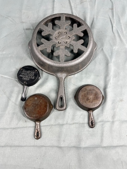 2- Toy Hammered Skillets, Campus Martius Souvenir Skillet and Foreign made Snowflake skillet