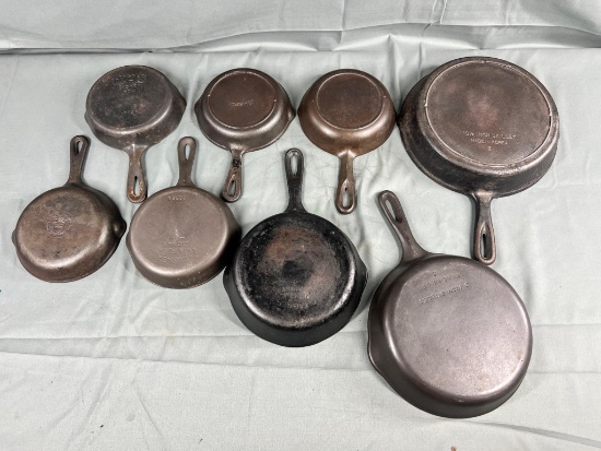 8- Cast Iron skillets, Wagner and unmarked, most are USA made