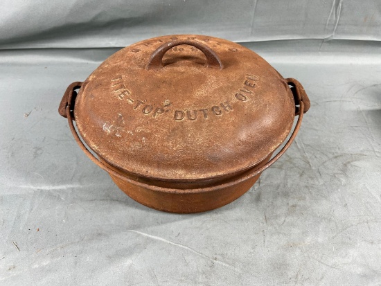 Griswold no. 9 Large Block Cast Iron Tite Top Dutch Oven, with lid and trivet, needs restored