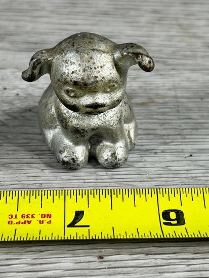 Cast Iron Pup marked Bucky Carbons Ribbons