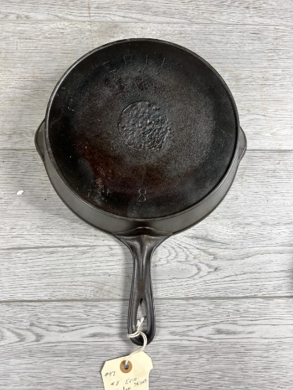Erie No. 8 Cast Iron Skillet w/ Spider Logo, pitting on bottom, skillet sits flat