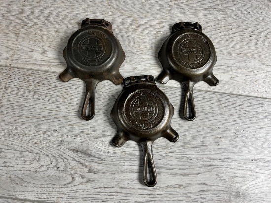 3- Griswold No. 00 Cast Iron Ashtrays