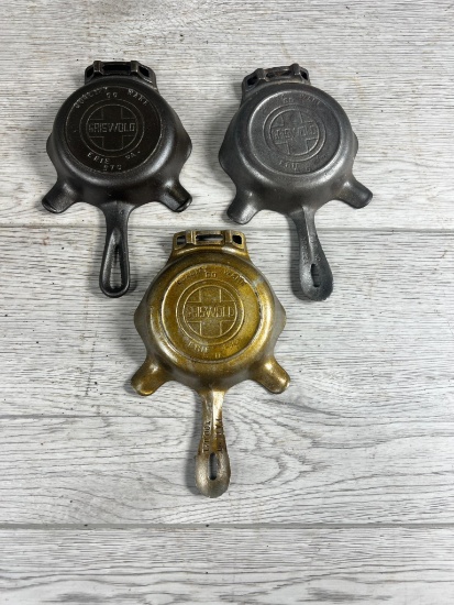 3- Griswold No. 00 Cast Iron Ashtrays