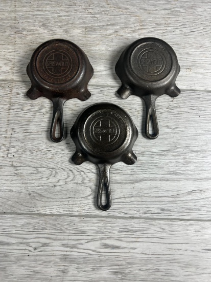 3- Griswold Cast Iron Ashtrays