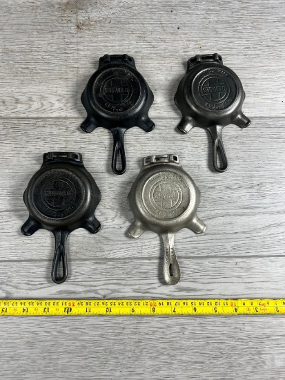 4- Griswold Cast Iron Ashtrays