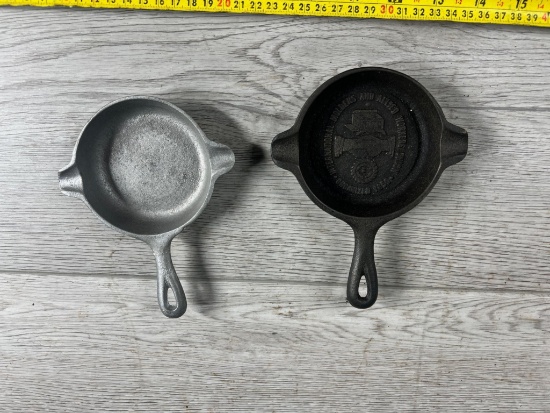 2- Cast Iron Ashtrays, one w/ advertising