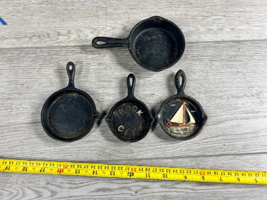 4- Miniature Cast Iron Skillets, 2 with designs